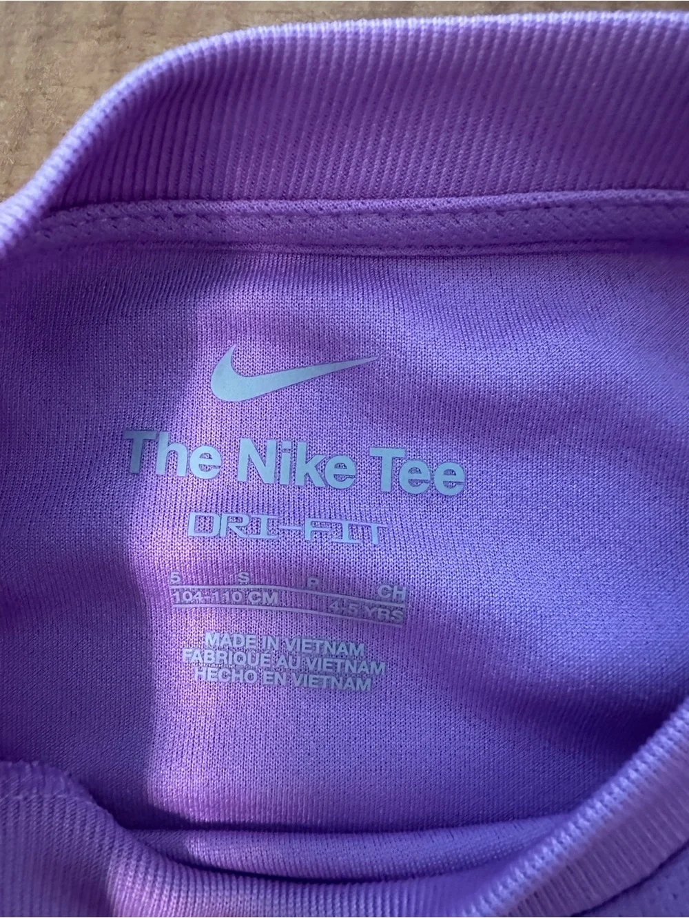 Nike Girls Short Sleeve Tee in Lavender with White Swoosh